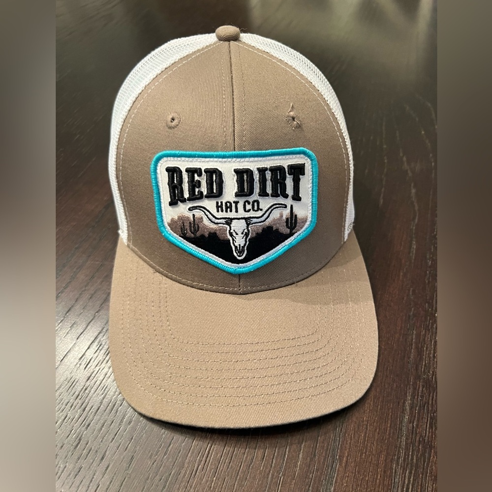 Red Dirt Hay Co. ball cap, tan and white
